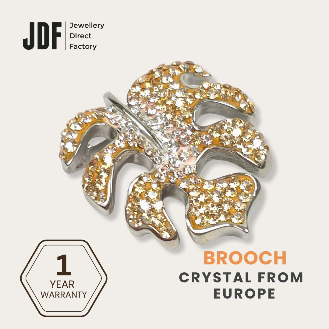 Iconic Monstera Leaf Brooch with Crystals from Europe, Brooch, Beige, Crystals from Europe, One-Year Warranty - Jewellery Direct Factory in alabaster background