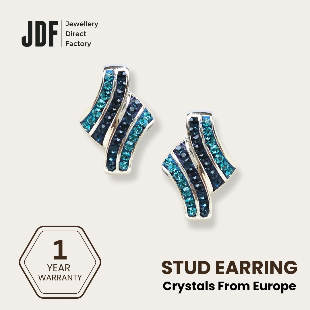 Elegance Twist Earrings with Crystals from Europe, Crystal Earrings, Blue, Crystals from Europe, One-Year Warranty - Jewellery Direct Factory in alabaster background