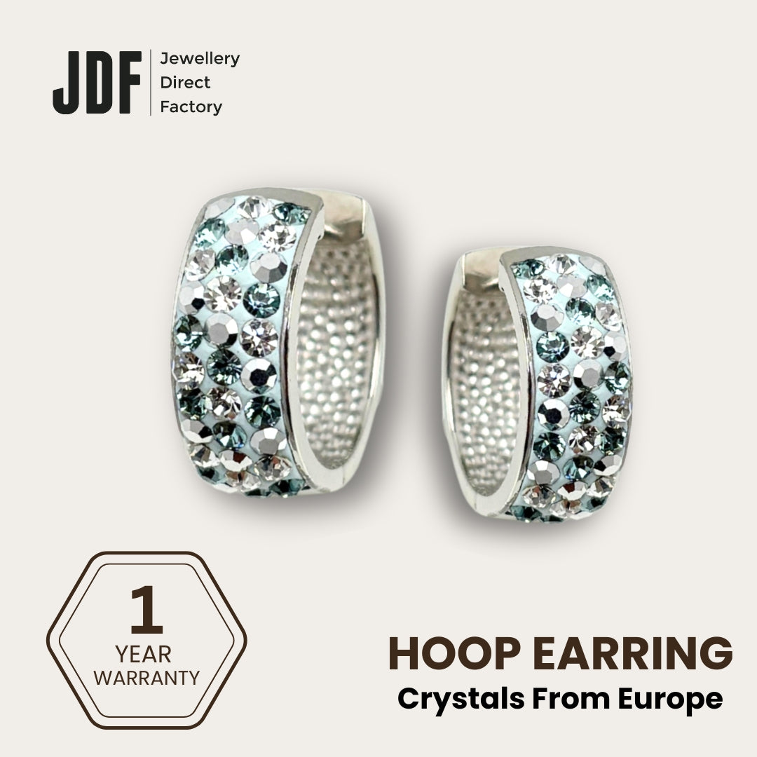 Huggie Hoops with Crystals From Europe, Earrings, Blue, Crystals from Europe, One-Year Warranty - Jewellery Direct Factory in alabaster background