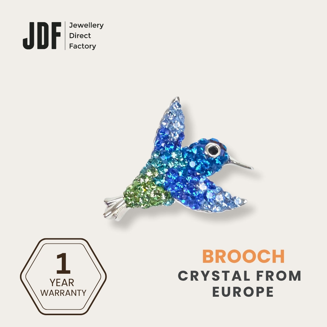 Hummingbird Brooch with Crystal From Europe, Brooch, Blue, Crystals from Europe, One-Year Warranty - Jewellery Direct Factory in alabaster background