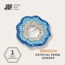 Minimalist Floral Brooch with Crystal From Europe, Brooch, Blue, Crystals from Europe, One-Year Warranty - Jewellery Direct Factory in alabaster background