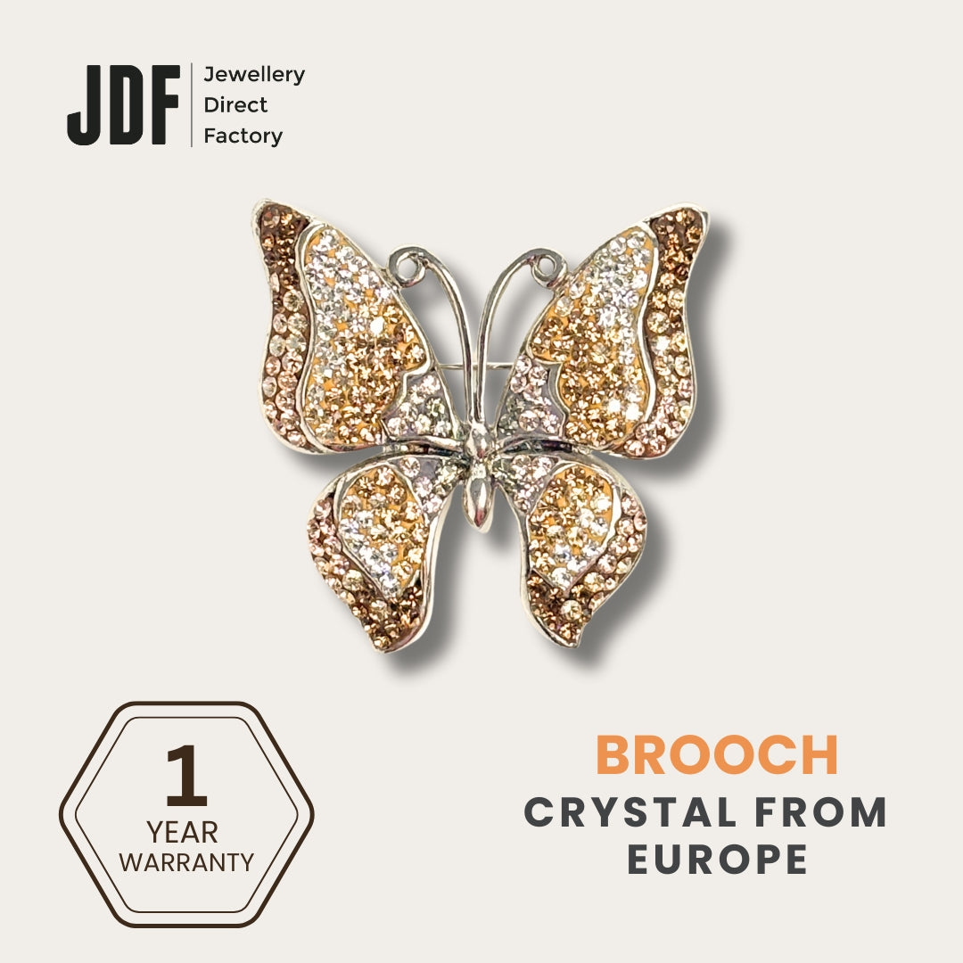 Elegant Butterfly Brooch with Crystal from Europe, Brooch, Champagne, Crystal from Europe, One-Year Warranty - Jewellery Direct Factory in alabaster background