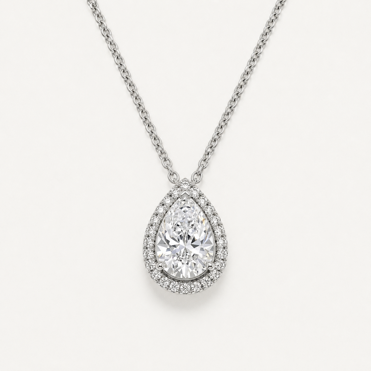 The Celeste 1.5cts Pear Halo Pendant