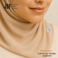 Crystal Water Drop Brooch with Crystal From Europe, Brooch, Worn on Tudung by Model, Crystals from Europe, One-Year Warranty - Jewellery Direct Factory in alabaster background