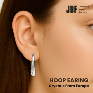 Elegant Drop Hoop Earrings with Crystals from Europe, Crystal Earrings, Worn by Model, Crystals from Europe, One-Year Warranty - Jewellery Direct Factory in alabaster background
