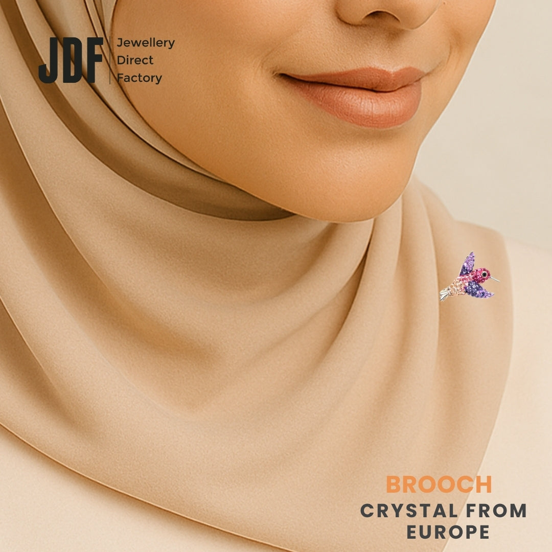 Hummingbird Brooch with Crystal From Europe, Brooch, Worn on Tudung by Model, Crystals from Europe, One-Year Warranty - Jewellery Direct Factory in alabaster background