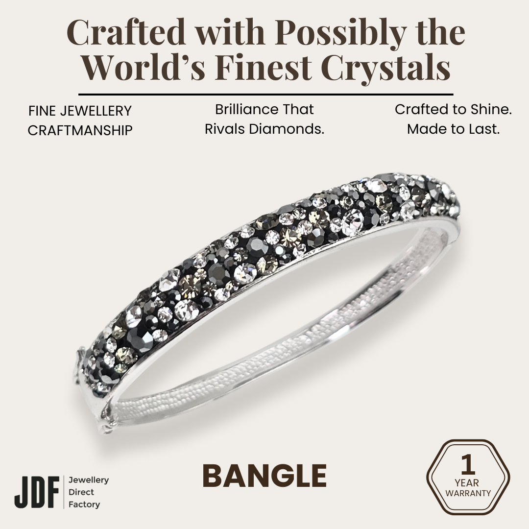 Luminous Pavé Hinge Bangle with Crystal From Europe, Crystal Bangle, Black, Crystal From Europe, One-Year Warranty - Jewellery Direct Factory in alabaster background