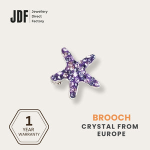 Glam Starfish Brooch with Crystal From Europe, Brooch, Purple, Crystals from Europe, One-Year Warranty - Jewellery Direct Factory in alabaster background