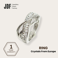 Crisscross Solitaire Ring with Crystal From Europe, Crystal Ring, White, Crystal From Europe, One-Year Warranty - Jewellery Direct Factory in alabaster background