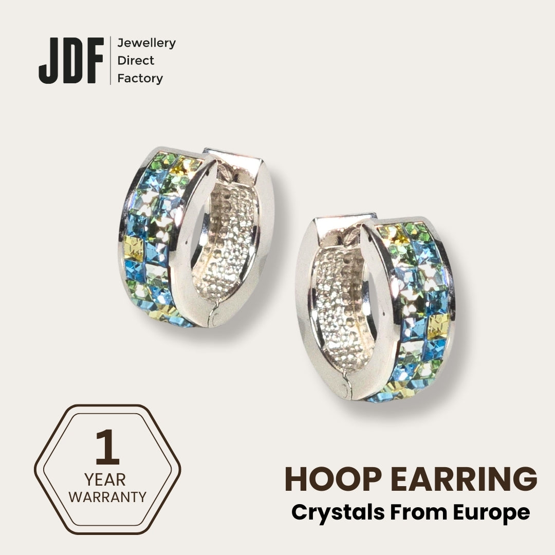 Princess Wide Huggies Earrings with Crystals from Europe, Crystal Earrings, White Gold, Crystals from Europe, One-Year Warranty - Jewellery Direct Factory in alabaster background