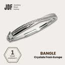 Grace Hinge Bangle with European Crystals, Crystal Bangle, White, Crystals From Europe, One-Year Warranty - Jewellery Direct Factory in alabaster background